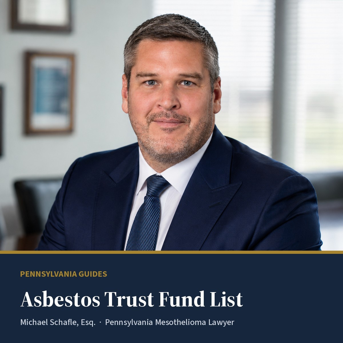 Michael Schafle, Esq., Pennsylvania mesothelioma lawyer, in a navy suit at his Philadelphia office, above a navy banner reading "Asbestos Trust Fund List".
