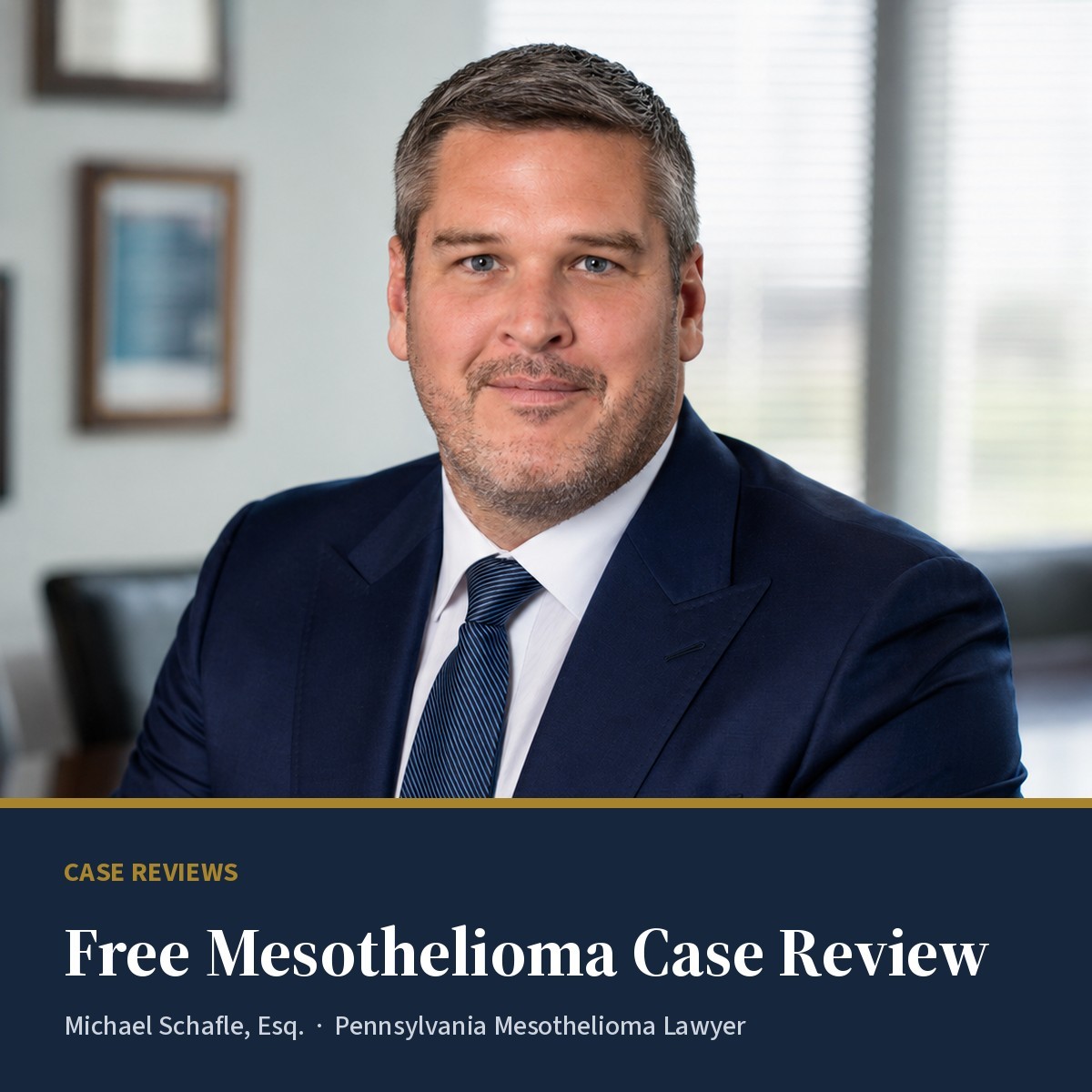 Michael Schafle, Esq., Pennsylvania mesothelioma lawyer, in a navy suit at his Philadelphia office, above a navy banner reading "Free Mesothelioma Case Review".